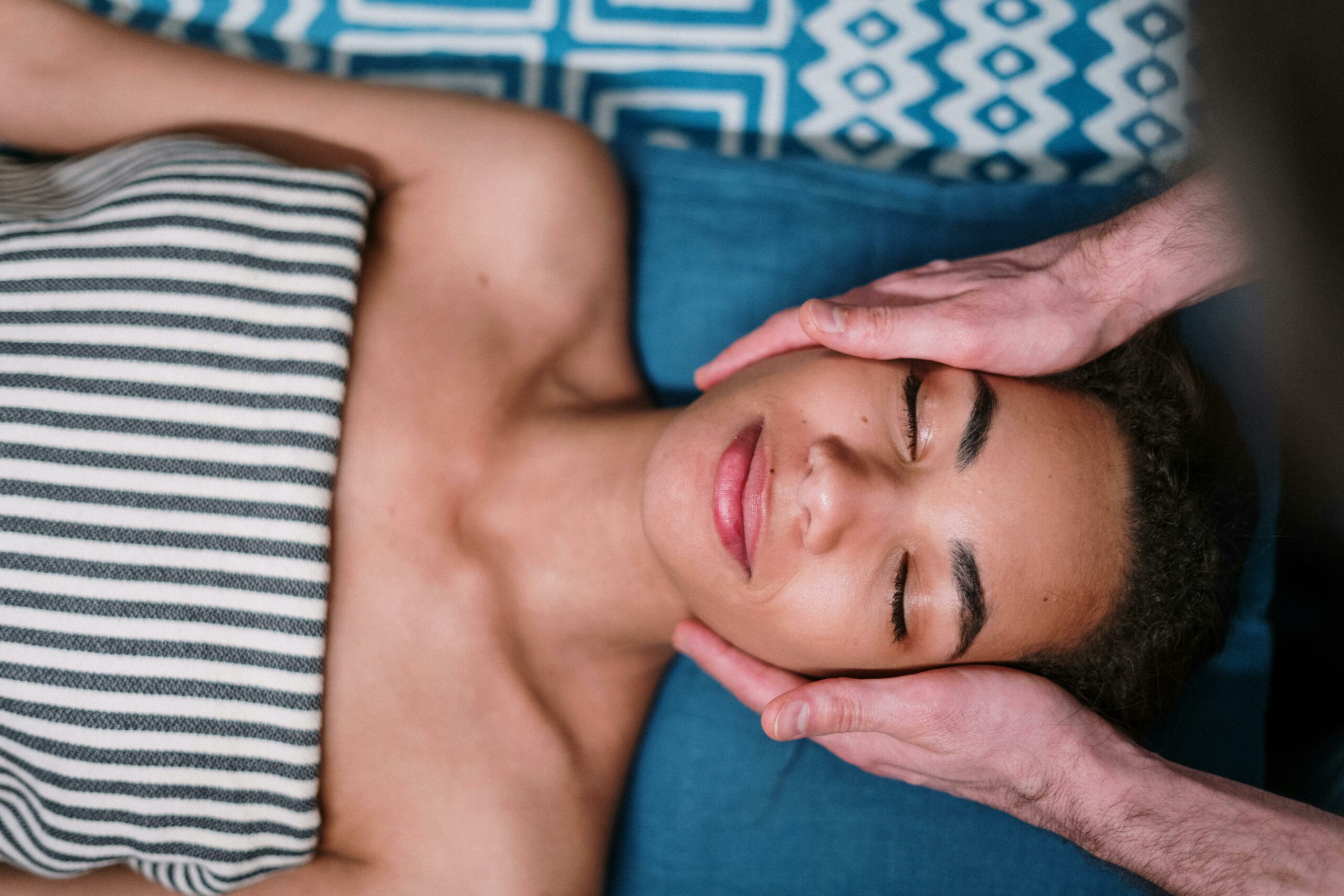 Woman receiving skin care like a facial as a beauty hack to enhance complexion